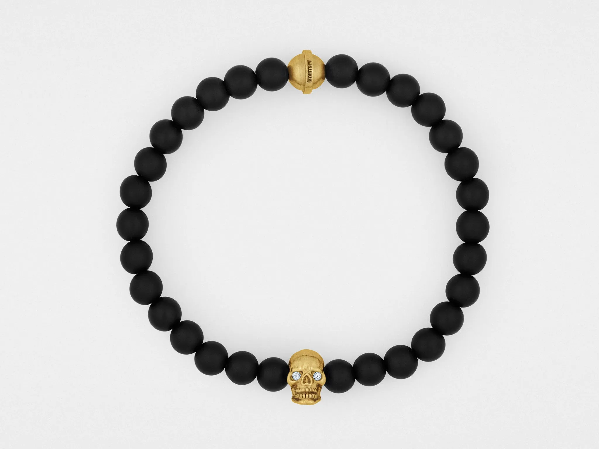 Skull Bracelet in 18K Gold with Diamond Eyes and Black Onyx